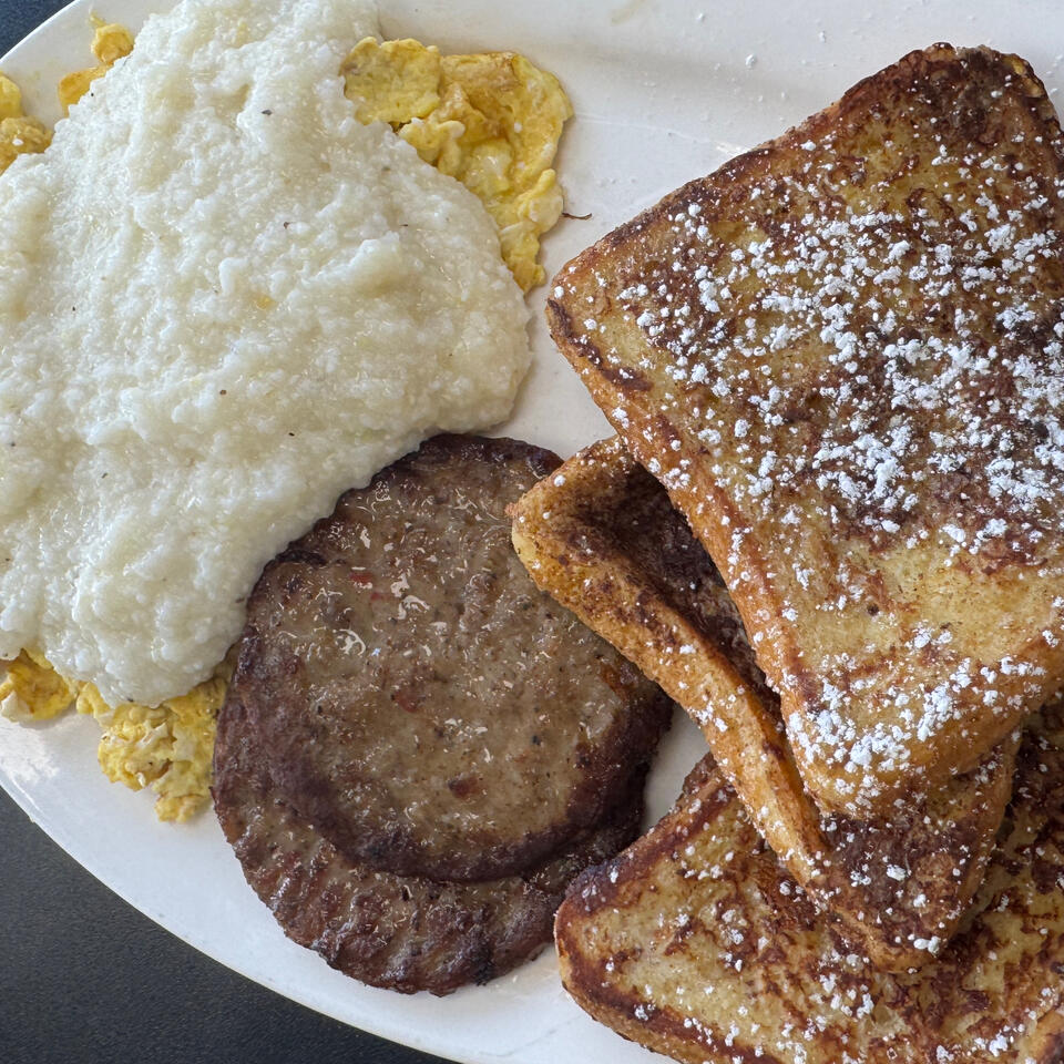 French Toast, Scrambled Eggs, Grits and Sausage